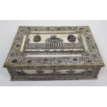 An Anglo-Indian Vizagapatam ivory writing box the hinged cover decorated with a fenced pavilion