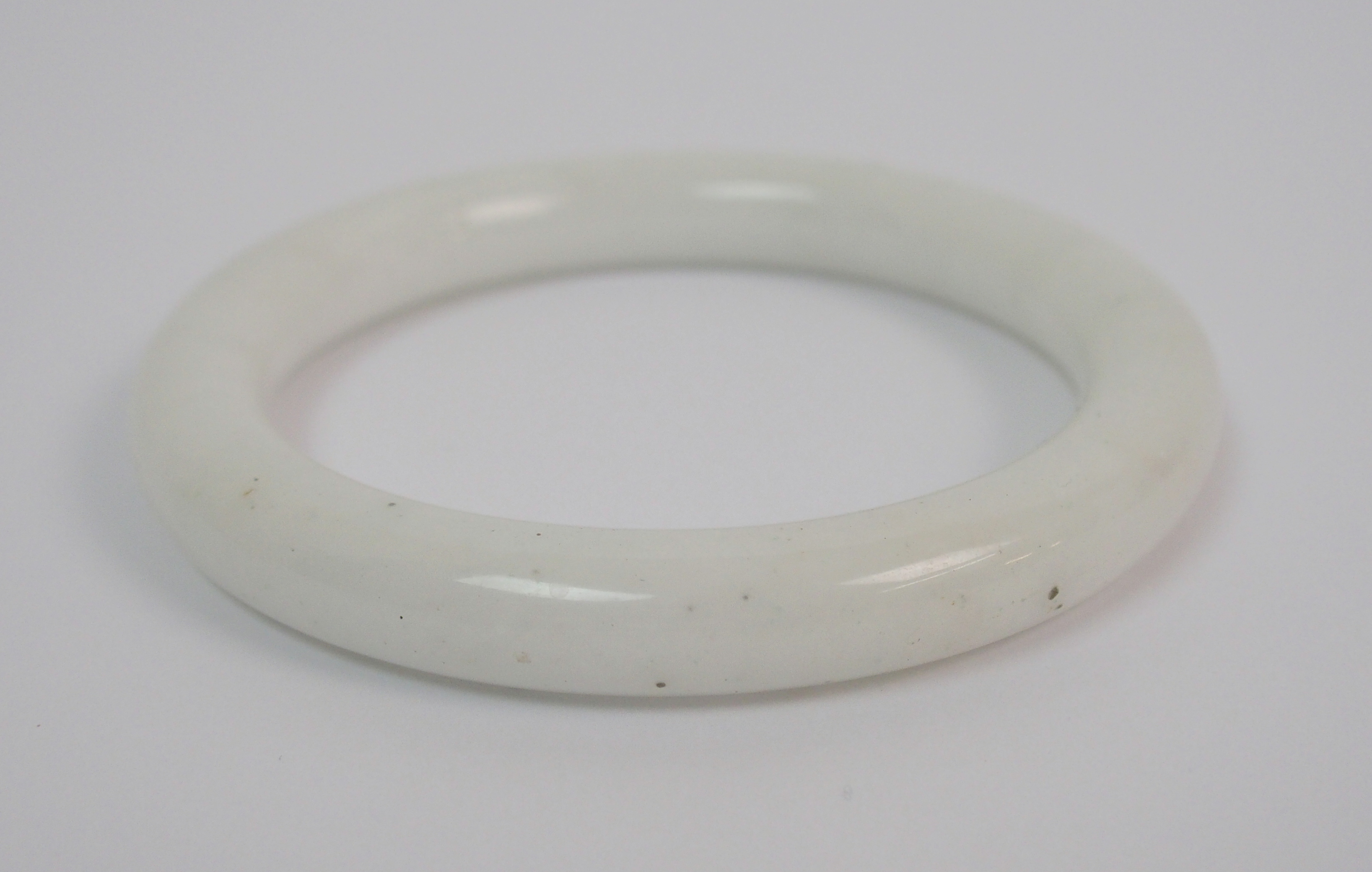 Two Chinese hardstone bangles 7cm diameter and an agate pendant, 5cm high (3) - Image 3 of 10