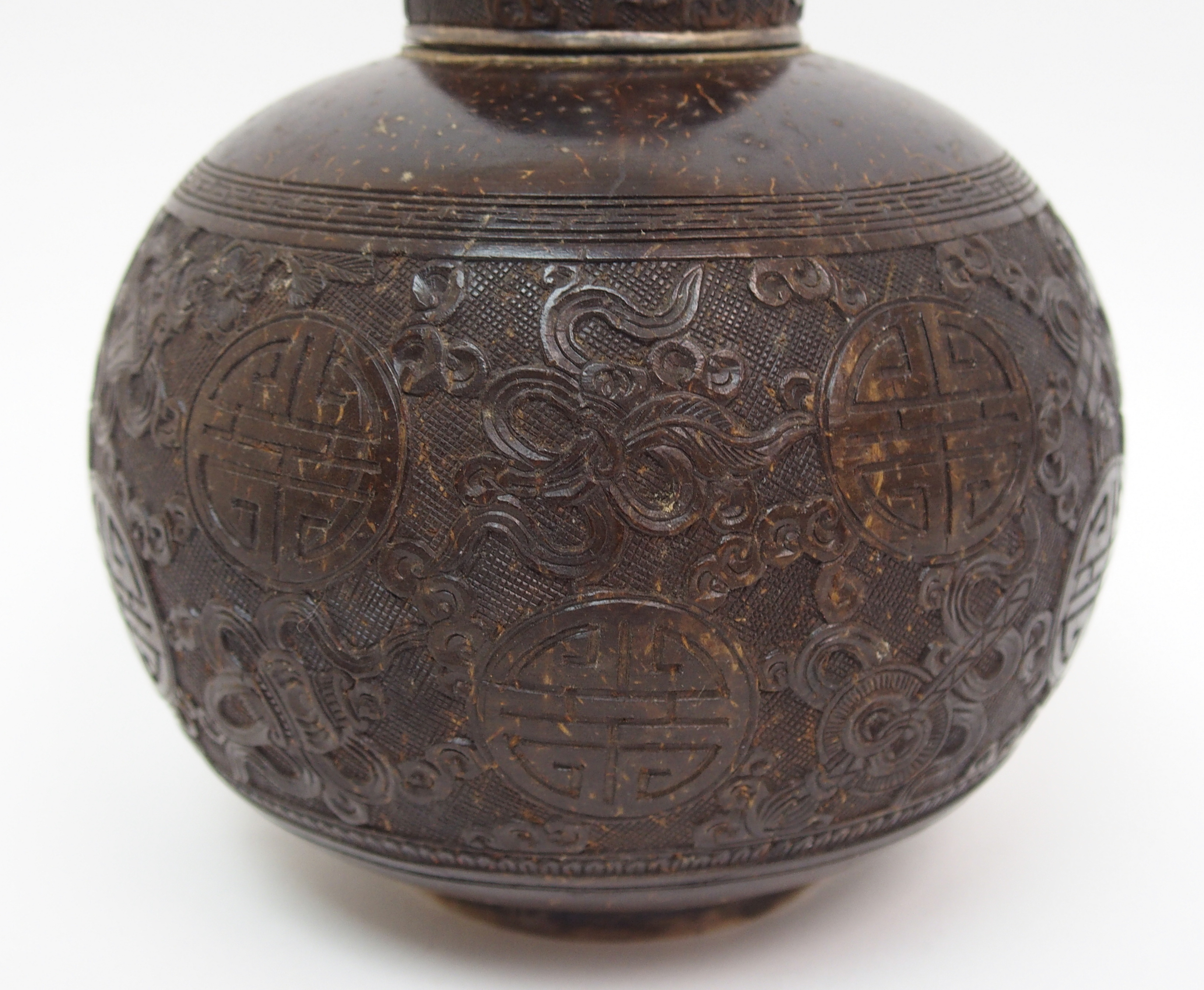 A Chinese coconut and silver mounted set comprising; bottle decanter and stopper, 15cm high, - Image 9 of 10