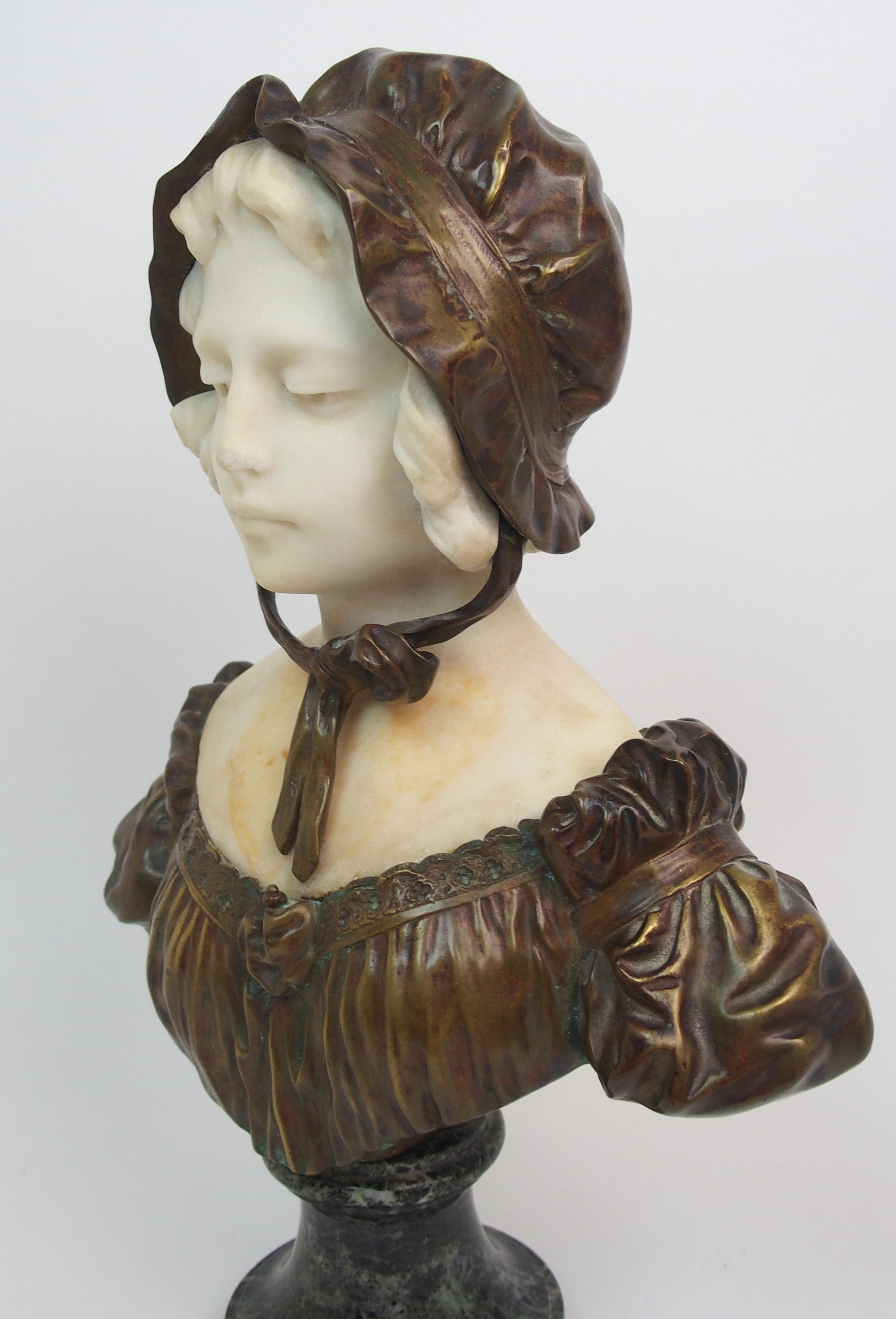 Affortunato Gory (active 1895-1925) Bronze and alabaster bust of a girl modelled wearing a bonnet, - Image 10 of 10