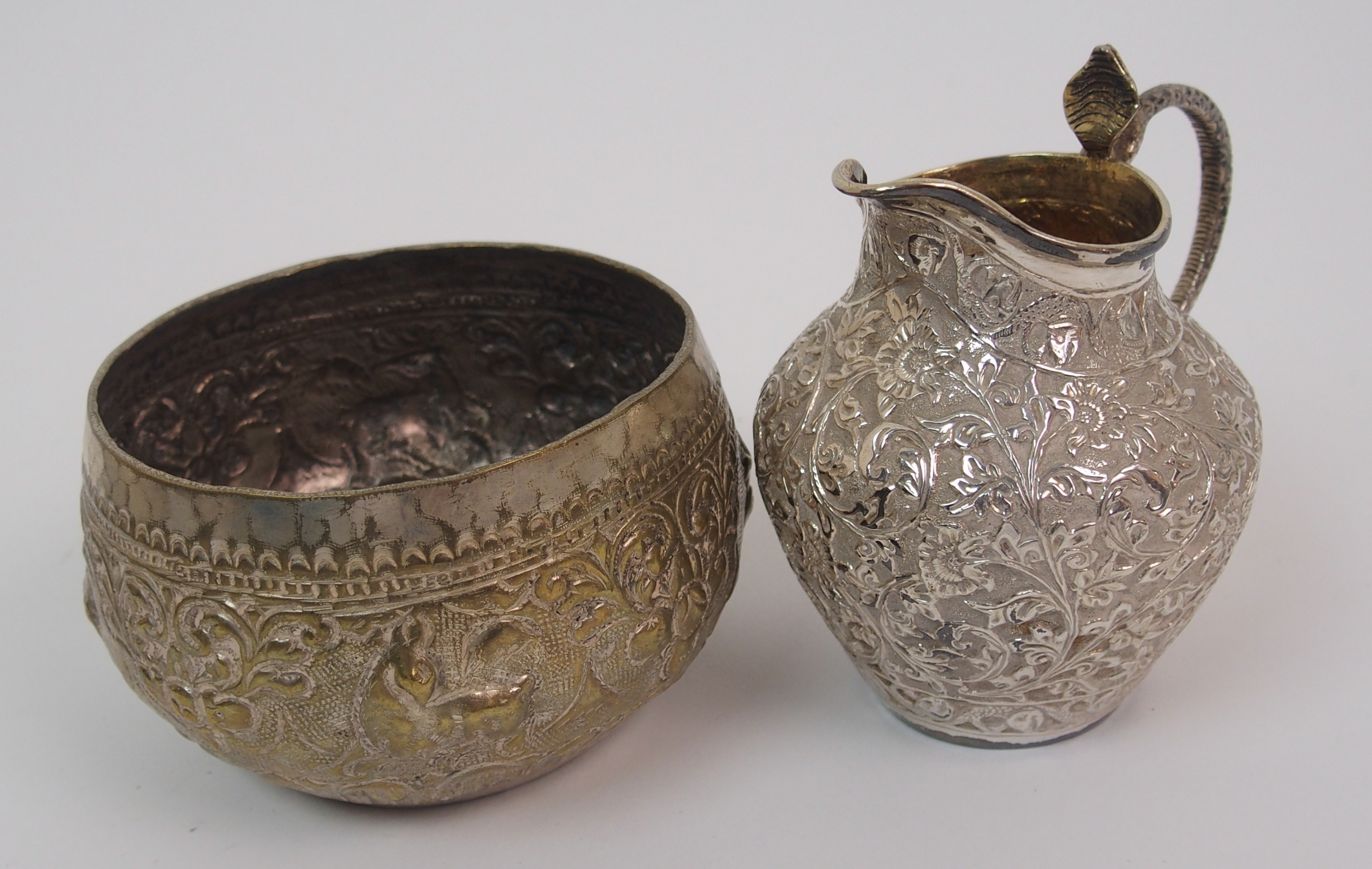 Nine Eastern white metal bowls 7.5 to 9.5cm diameter, a salver decorated with animals 26cm - Image 4 of 10