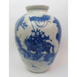 A Chinese blue and white baluster vase painted with warriors on horseback carrying flags beneath