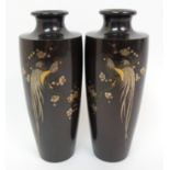 A pair of Japanese bronze vases each decorated with cockerels amongst blossoming trees, signed,