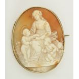 A large shell cameo in a 9ct brooch mount depicting Mary and Jesus. Dimensions 6cm x 5cm, weight