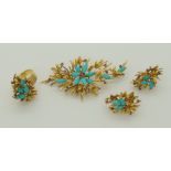 A suite of retro turquoise and ruby jewellery comprising of a brooch in 18ct yellow gold with