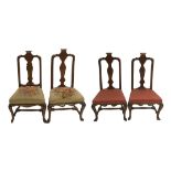 A set of four Spanish walnut chairs with scroll and vase shaped back splats above floral woolwork