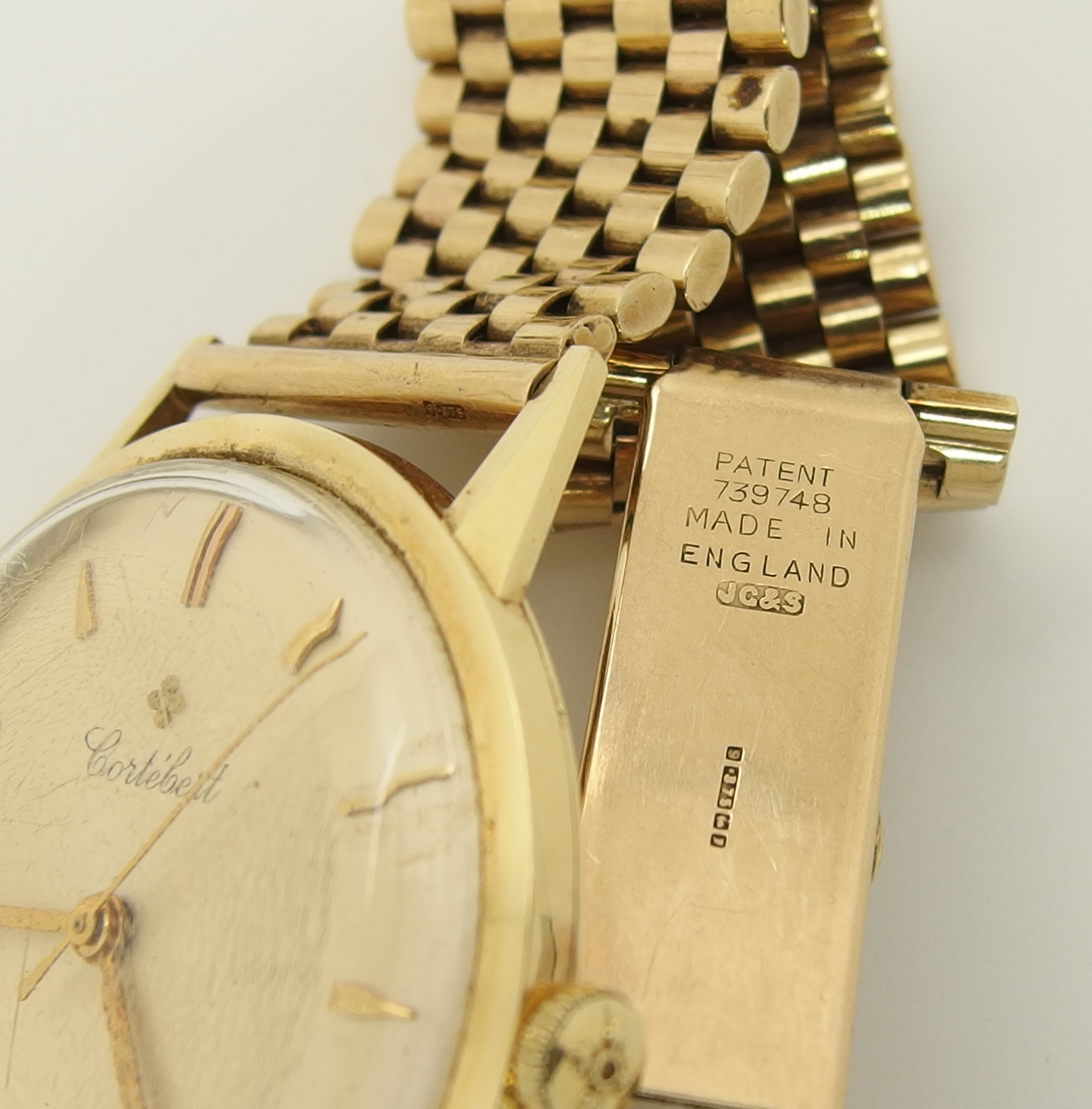 A 14ct gold Cortebert gents watch with a 9ct gold strap, the champagne dial has gold coloured - Image 2 of 3