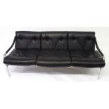 A black leather and chrome Pirelli three seater sofa designed by Tim Bates for Pieff, 73cm high x