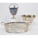 A silver twin handled basket by D & J Wellby Limited, London 1913, of oval shape with pierced