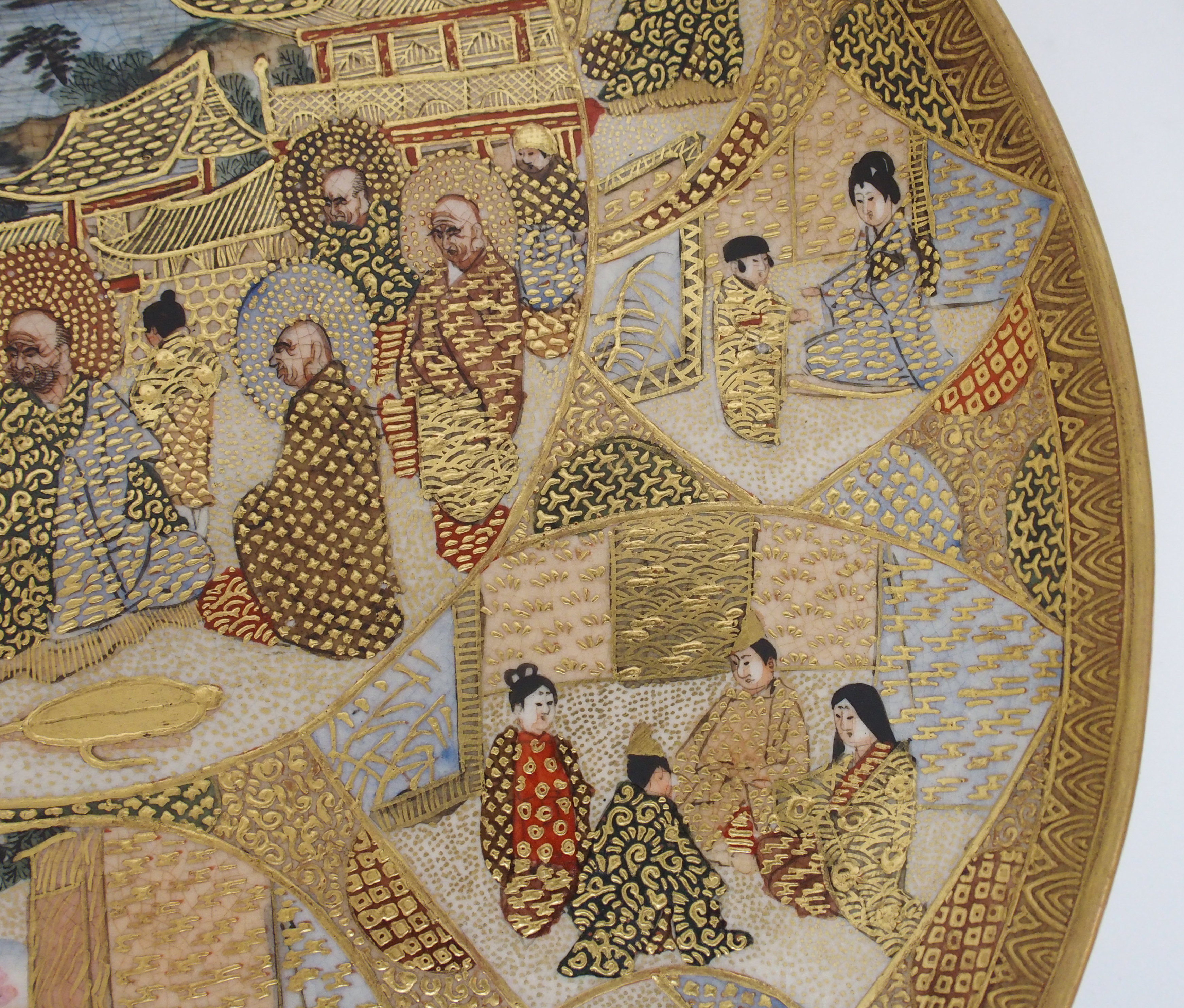 A Satsuma dish painted with Sennin and panels of figures within vignettes and amongst gilt diaper - Image 9 of 10