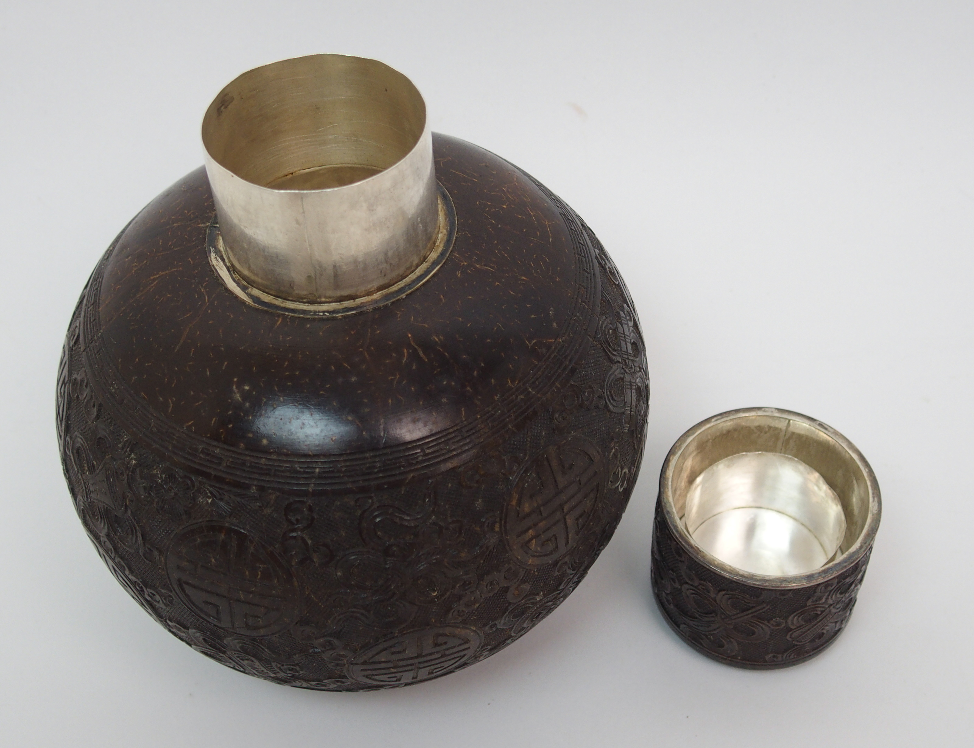 A Chinese coconut and silver mounted set comprising; bottle decanter and stopper, 15cm high, - Image 10 of 10