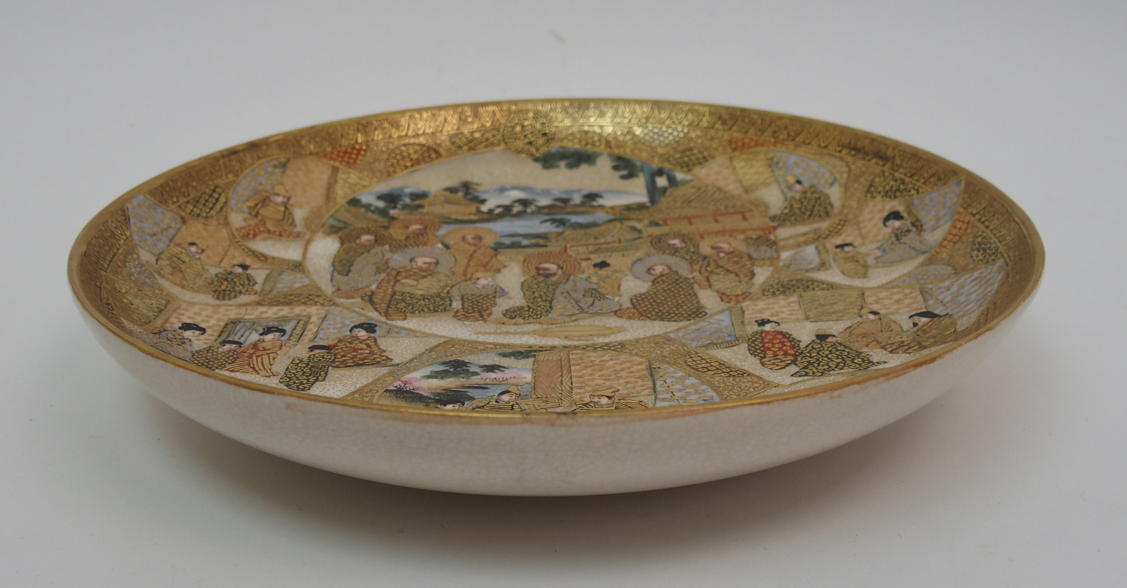 A Satsuma dish painted with Sennin and panels of figures within vignettes and amongst gilt diaper - Image 2 of 10
