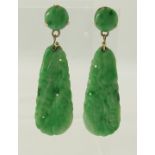 A pair of Chinese green hardstone earrings carved with fruit, mounted in yellow metal with 14ct gold