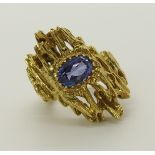 A 14ct gold retro tanzanite ring tanzanite was discovered as a new gem in 1967, so this ring would