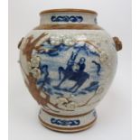 A Chinese crackle ware vase painted in blue with figures, lilies and blossoming trees applied with