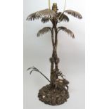 A Victorian silver plated centrepiece modelled as a palm tree with stag figure, on naturalistic