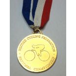 A yellow-metal British Cycling Federation National Championship gold medal the obverse inscribed