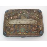 A Middle-Eastern white-metal and enamel cigarette case with hinged body of filigree design, with