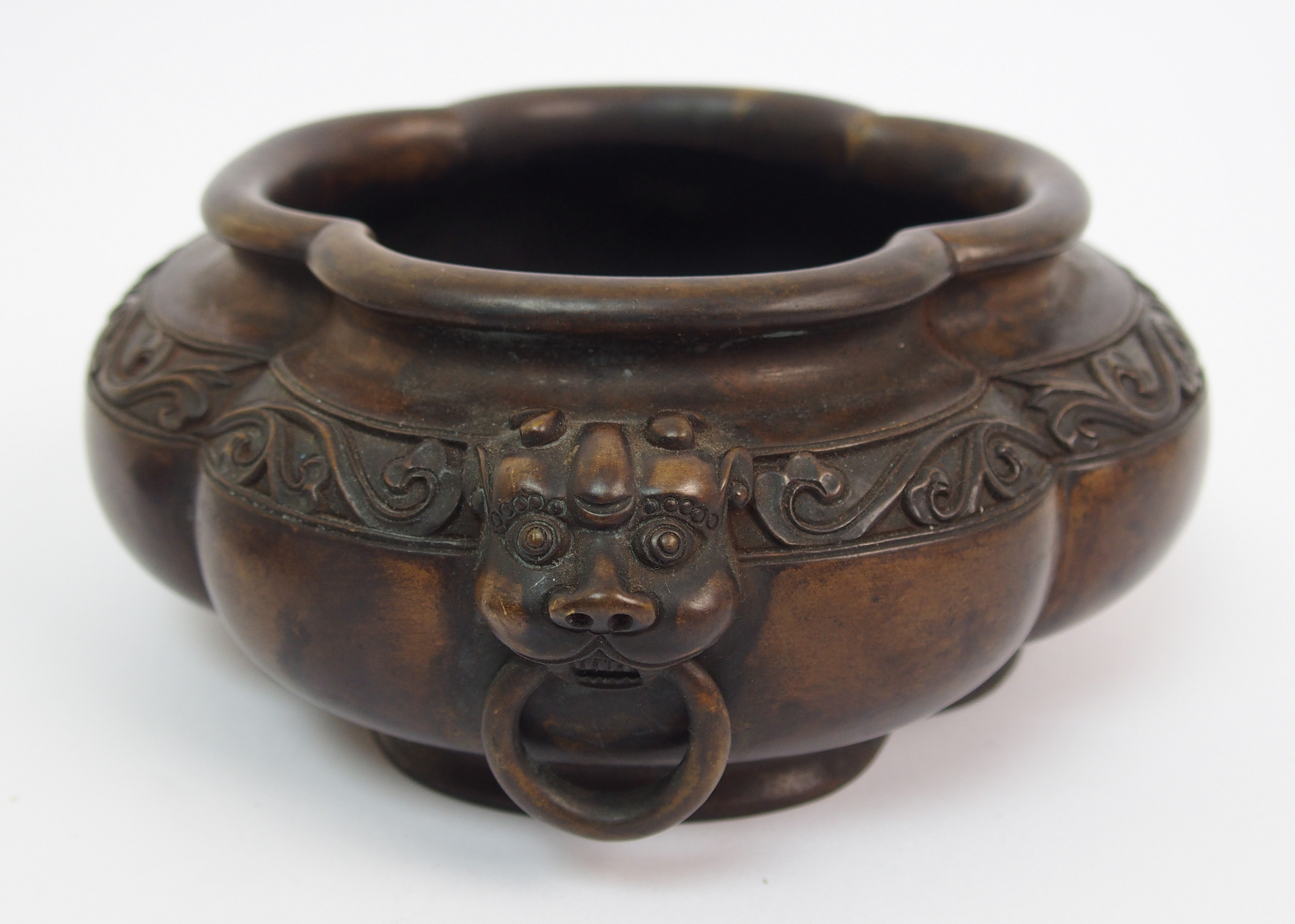 A Chinese bronze censer of quatrefoil lobed form, the shaped rim above a band of lotus and flanked - Image 4 of 10