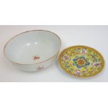 A Chinese export punch bowl painted with scattered flowers beneath a cell pattern rim, 26.5cm