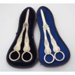 A pair of cased silver grape scissors by John Taylor (probably), London 1866, 18cm long, double