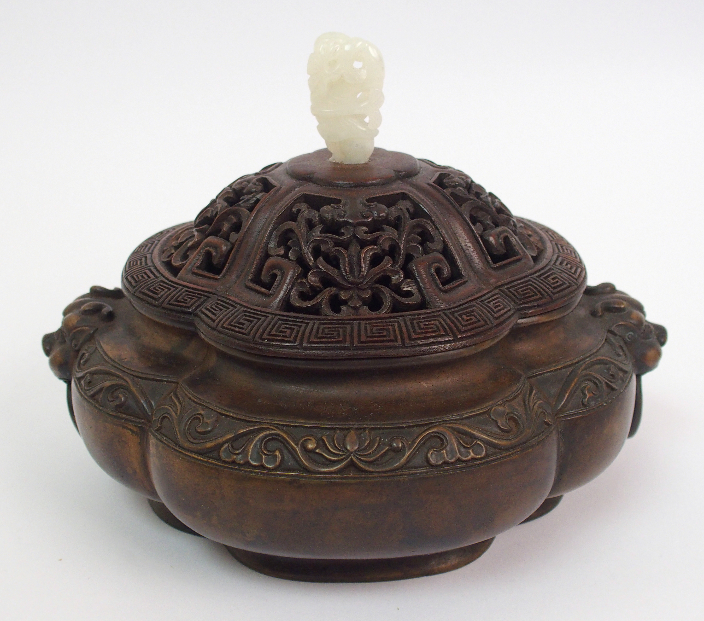 A Chinese bronze censer of quatrefoil lobed form, the shaped rim above a band of lotus and flanked - Image 6 of 10