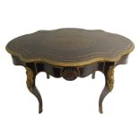 A Louis XV style ebonised and gilt metal oval shaped centre table decorated with a foliate diaper