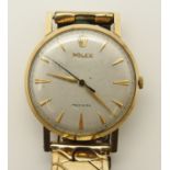 A 9ct gold cased Gents Rolex Precision watch head with gold chevron shaped numerals, gold coloured
