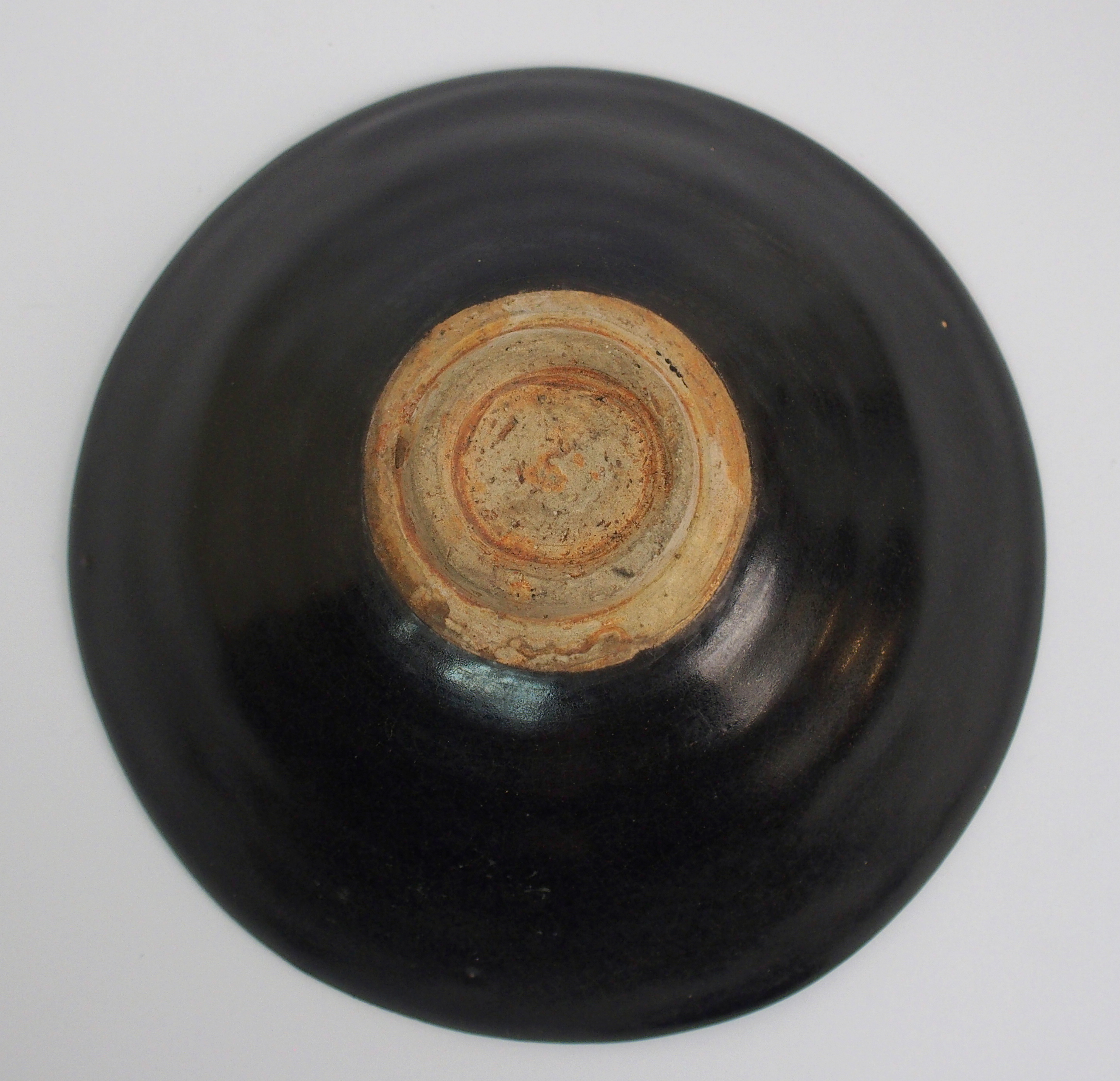 A Chinese black glazed bowl with single leaf decoration, 15.5cm diameter - Image 7 of 10