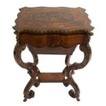 A Louis XV style gilt metal-mounted rosewood and inlaid sewing table the foliate scroll shaped top