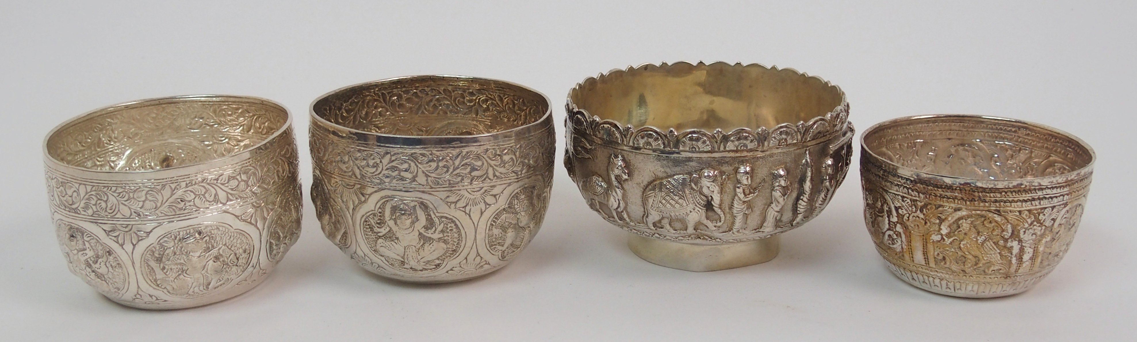 Nine Eastern white metal bowls 7.5 to 9.5cm diameter, a salver decorated with animals 26cm - Image 6 of 10