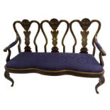 A Spanish ebonised, gilt and polychrome three seat settee with vase shaped and scallop shell back