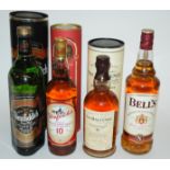 A bottle of Laphroiag 10 year old malt whisky, 70cl, 40% vol Macallan 10 year old, Glenlivet 12 year