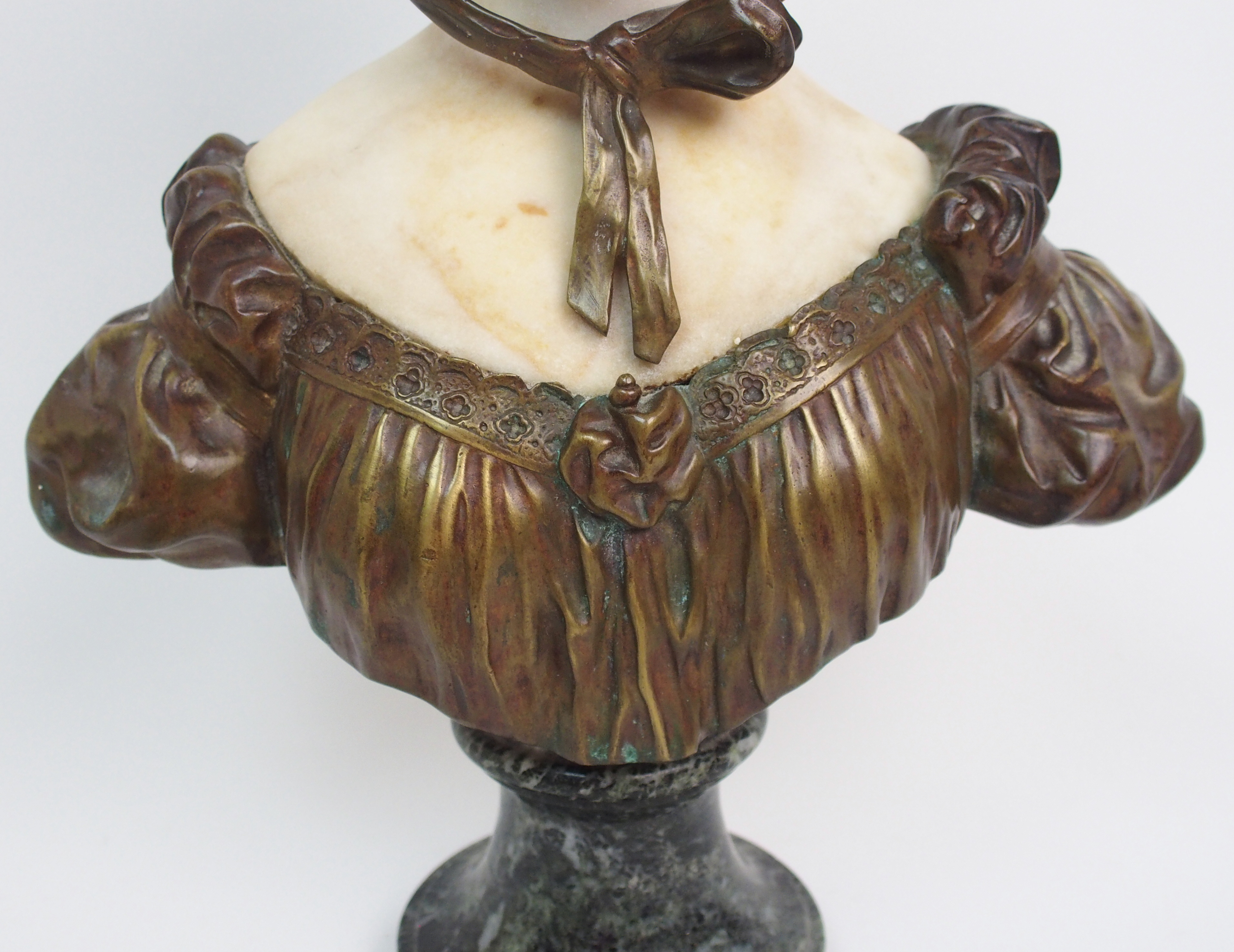 Affortunato Gory (active 1895-1925) Bronze and alabaster bust of a girl modelled wearing a bonnet, - Image 4 of 10