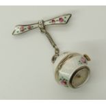 A silver enamelled pendant watch with white guilloche enamel painted with roses, the champagne