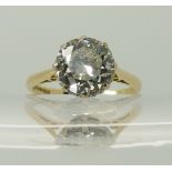 An 18ct old cut solitaire diamond ring the old cut diamond measures 8.56mm x 8.63mm x 4.46mm and its
