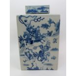 A Chinese blue and white square vase and cover painted with warriors in conflict beneath a landscape
