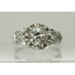 A platinum diamond ring diamond estimated approx 1ct, set in a scrolled mount and further rose cut