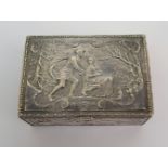 A silver box with import marks for Berthold Muller, London 1910 of rectangular shape, the hinged