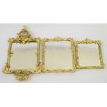 A 19th Century giltwood and gesso rococo style wall mirror 56cm high and another two mirrors, 37cm