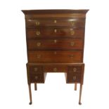 A mahogany tallboy the dentil cornice above four graduating drawers above a pair of base drawers