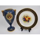 A Royal Worcester cabinet plate painted with pears and plums by A Shuck surrounded by a decorative
