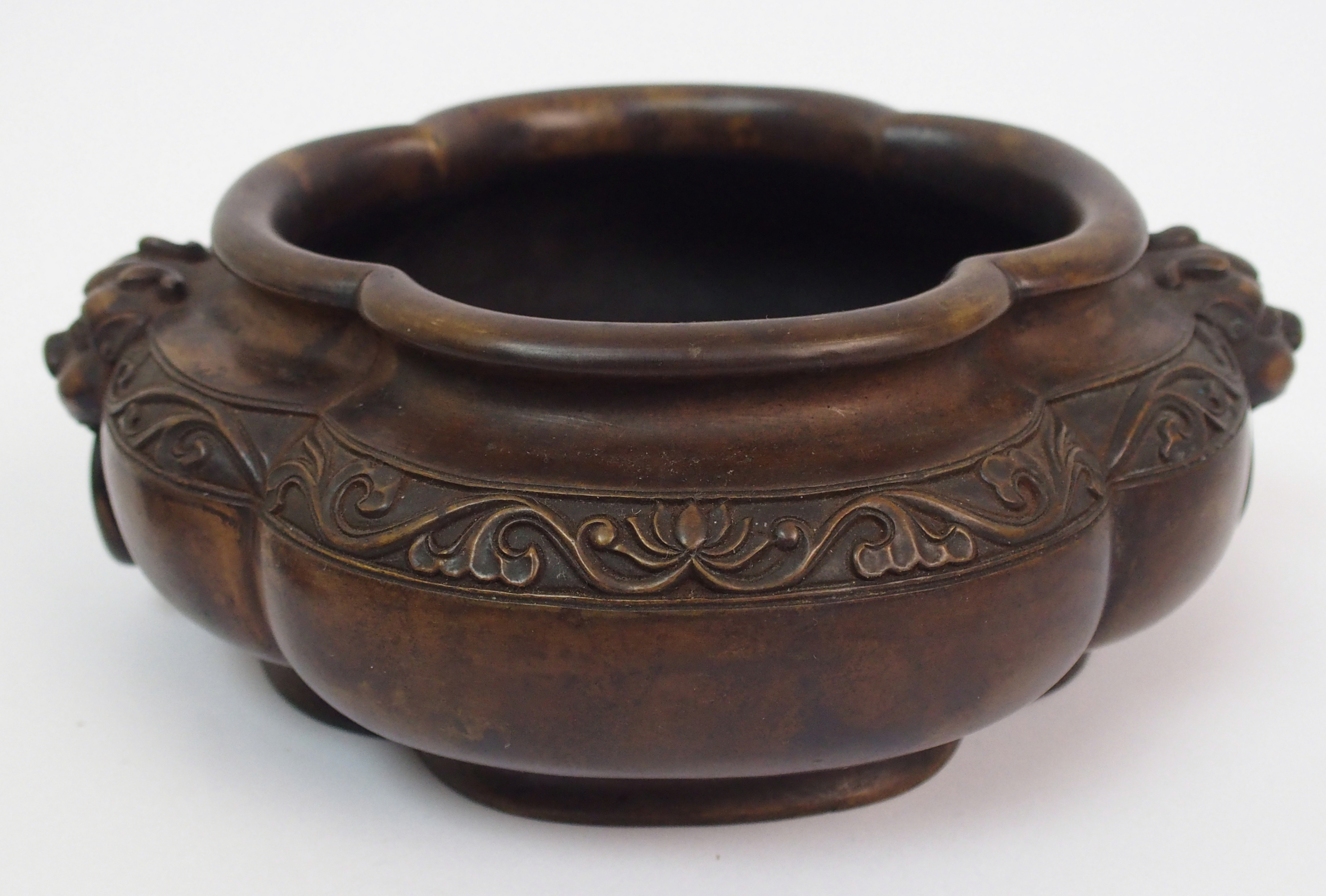 A Chinese bronze censer of quatrefoil lobed form, the shaped rim above a band of lotus and flanked - Image 5 of 10