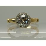 An 18ct gold ring set with an old cut diamond the old cut diamond is estimated approx 1ct, set in