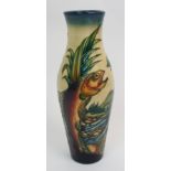 A Moorcroft Pottery Trout pattern vase designed by Phillip Gibson, tubelined with jumping trout in a