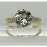 An old cut diamond ring the diamond estimated approx 1.17cts, in a diamond set crown mount with
