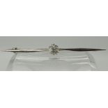 A white metal mounted old cut diamond bar brooch diamond estimated approx 0.46cts, length of