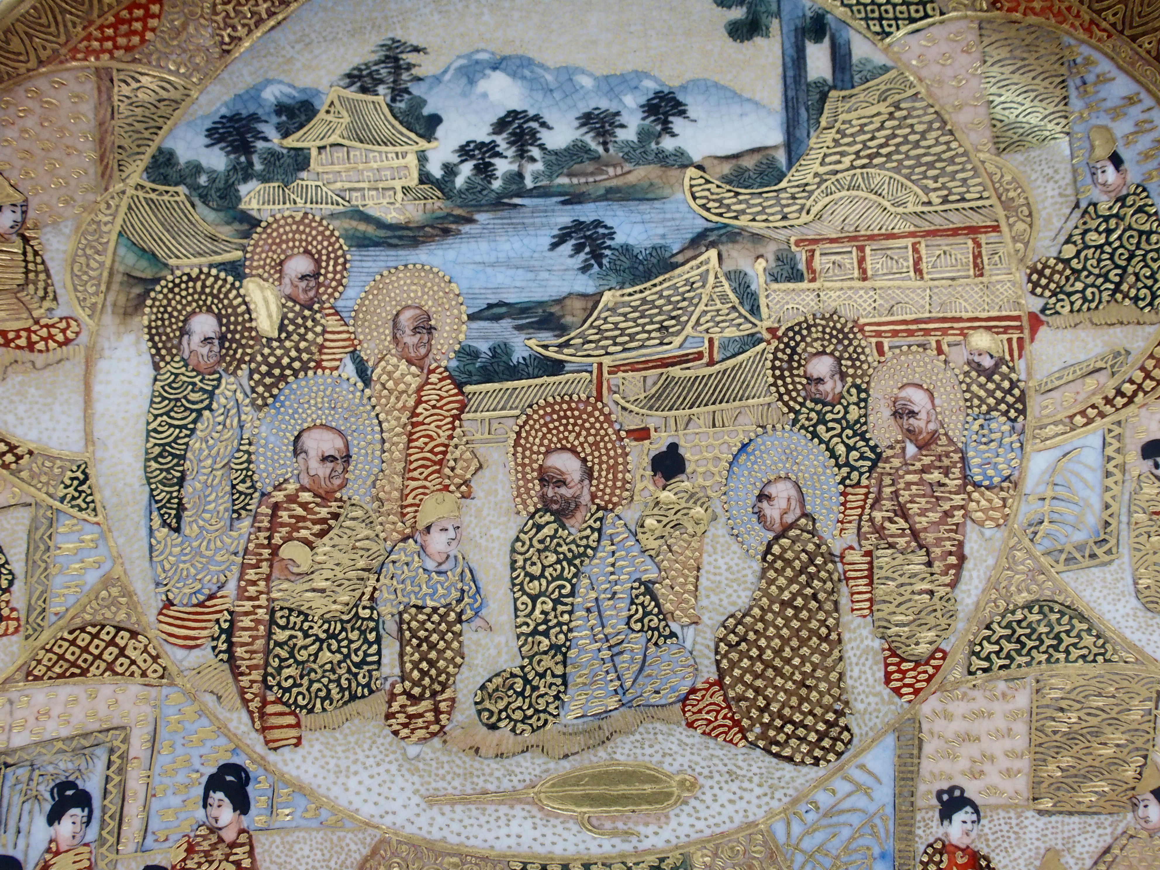 A Satsuma dish painted with Sennin and panels of figures within vignettes and amongst gilt diaper - Image 6 of 10