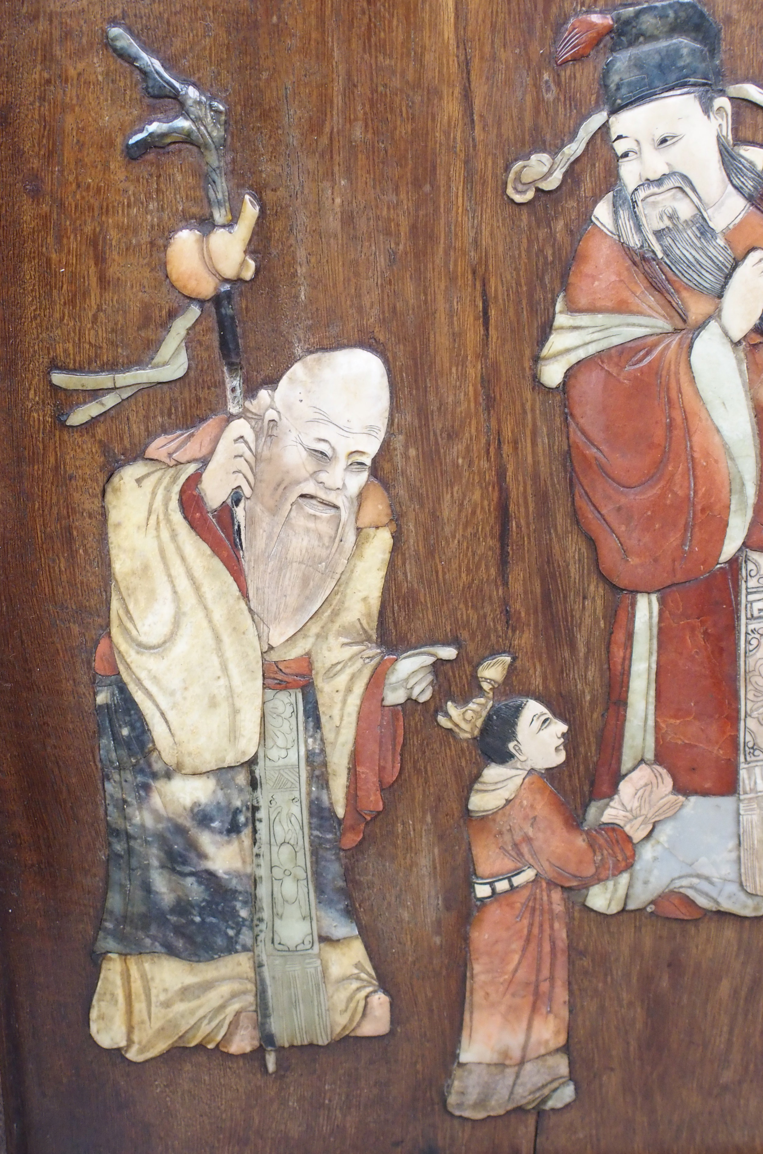 A Chinese table screen decorated with figures in hardstones on a stand carved with foliage, 59cm - Image 3 of 10