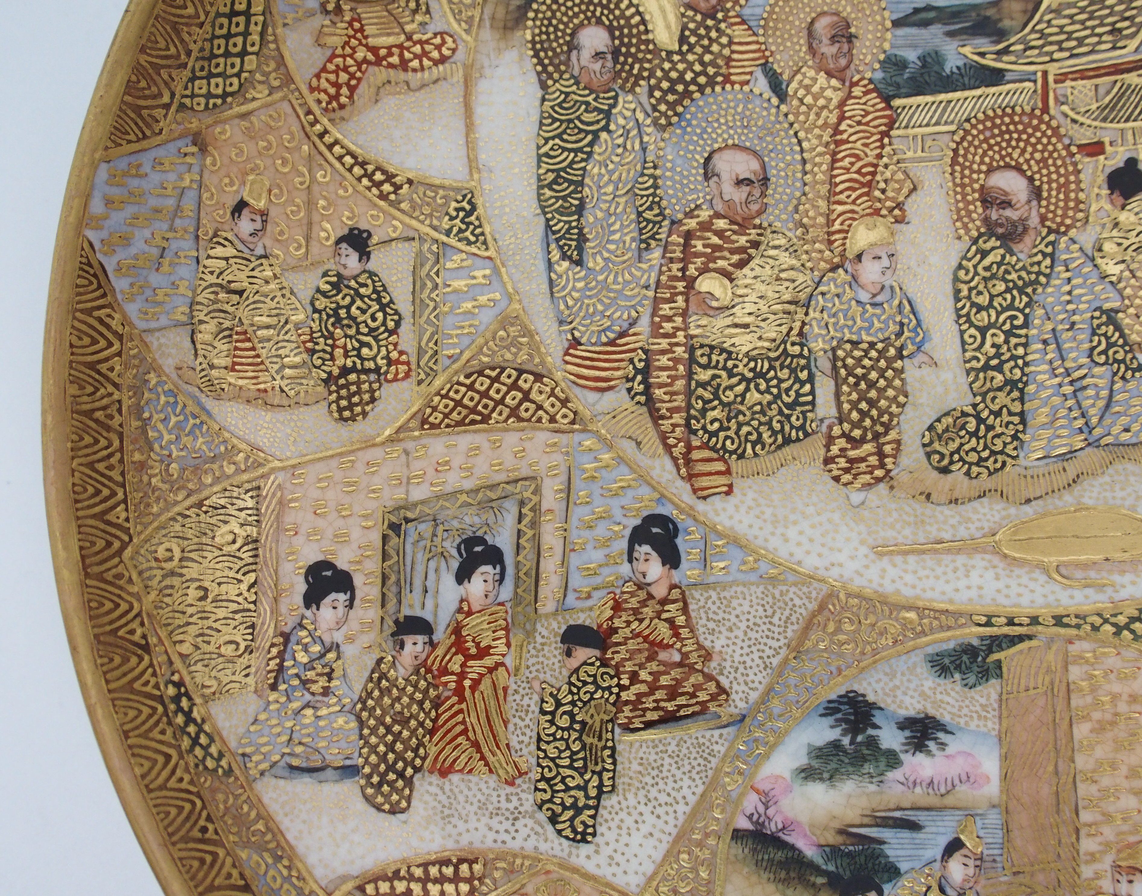 A Satsuma dish painted with Sennin and panels of figures within vignettes and amongst gilt diaper - Image 8 of 10